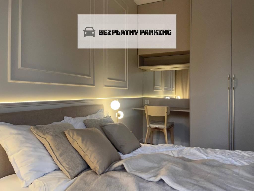 En eller flere senge i et værelse på Apartamenty Premium Przy Plaży Morzlive