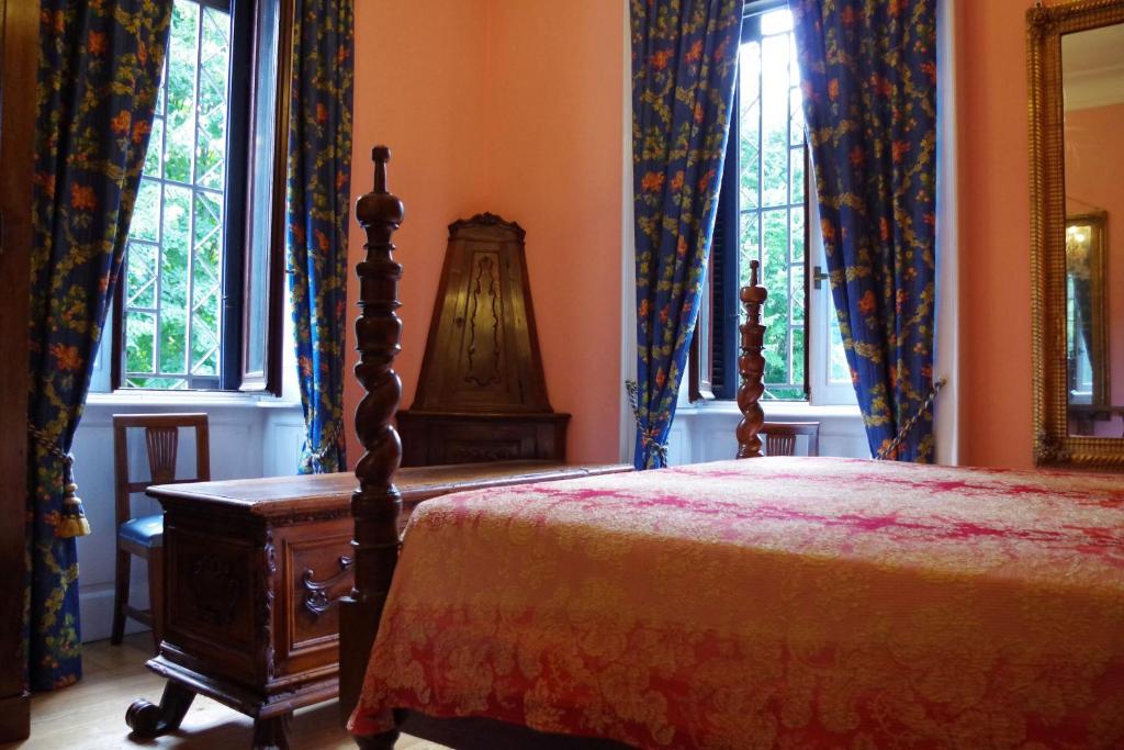 A bed or beds in a room at Villa Puccini
