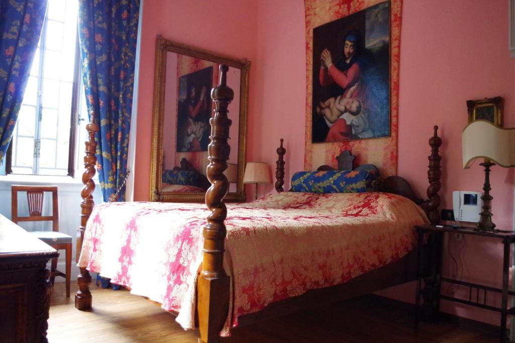 A bed or beds in a room at Villa Puccini