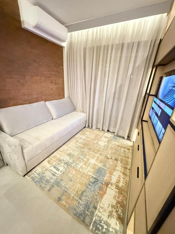 Χώρος καθιστικού στο Studio Mandarim Campolim - Vista Cidade