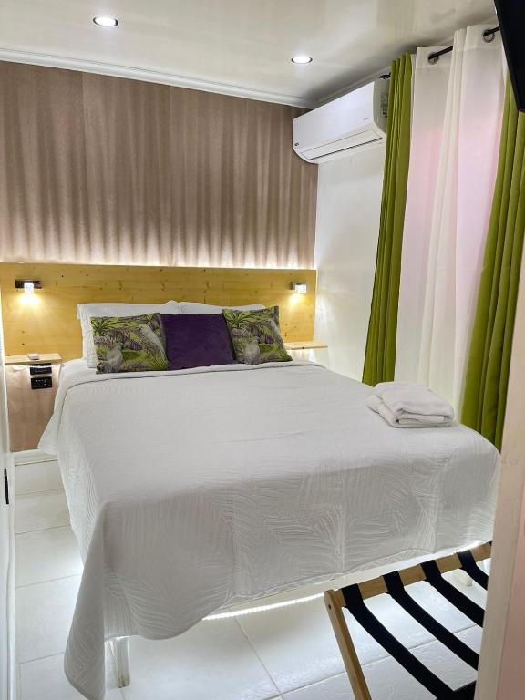 Ένα ή περισσότερα κρεβάτια σε δωμάτιο στο Jazmin's Apartments