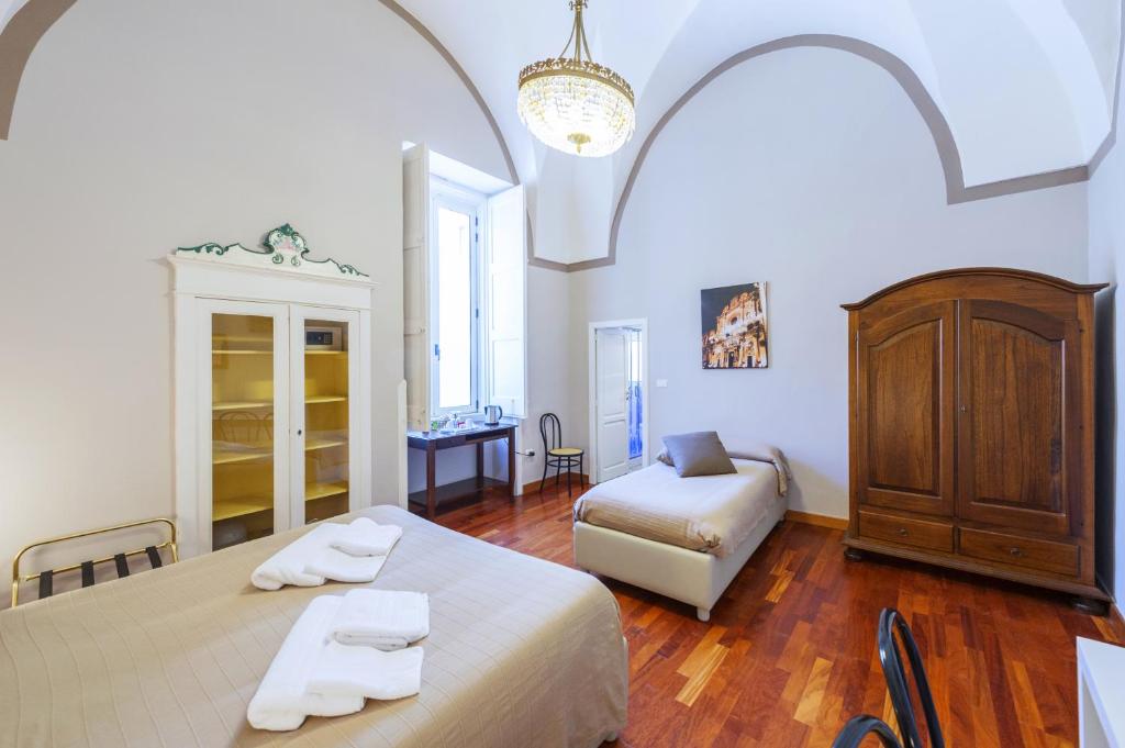 Postel nebo postele na pokoji v ubytování B&B Centro Storico Lecce