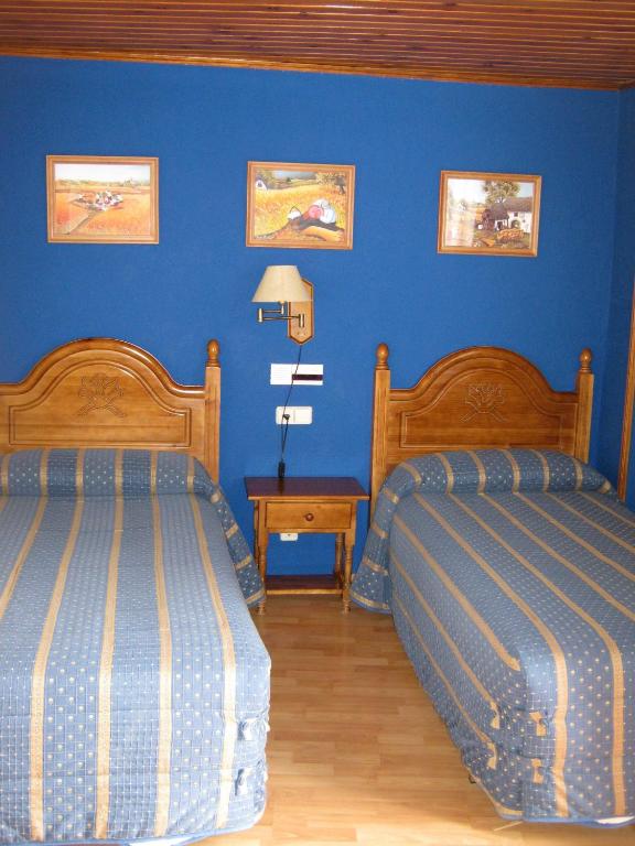 Postel nebo postele na pokoji v ubytování Casa La Abadía
