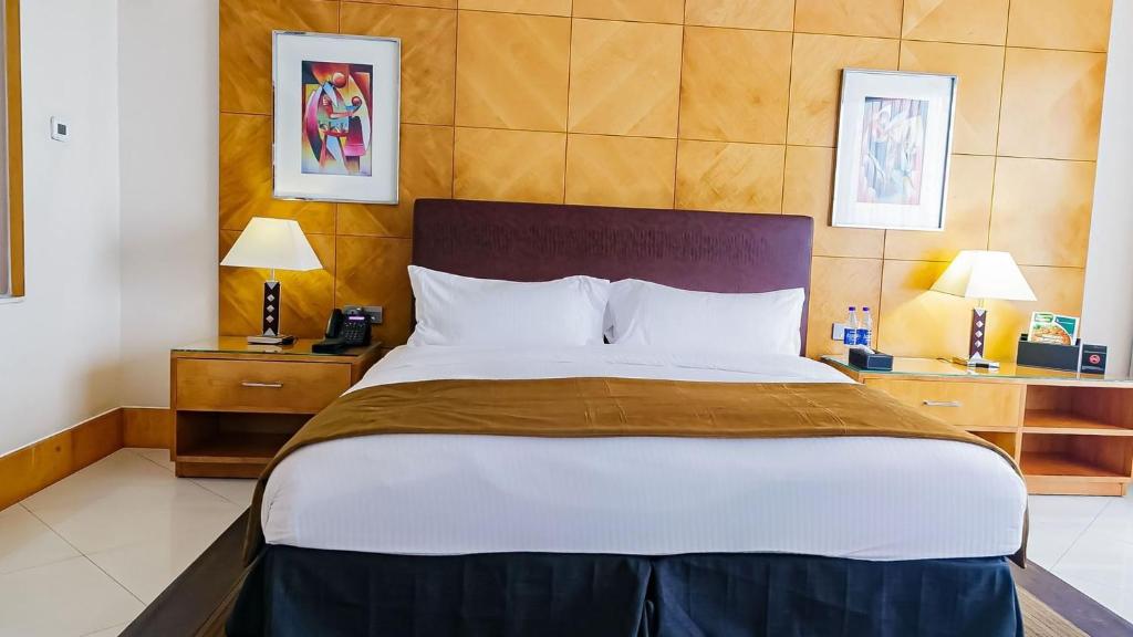 Кровать или кровати в номере D'Villa Guesthouse Airport Junction