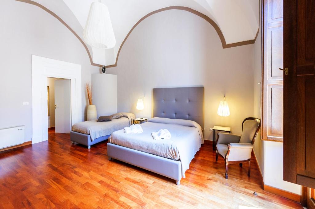 Postel nebo postele na pokoji v ubytování B&B Centro Storico Lecce
