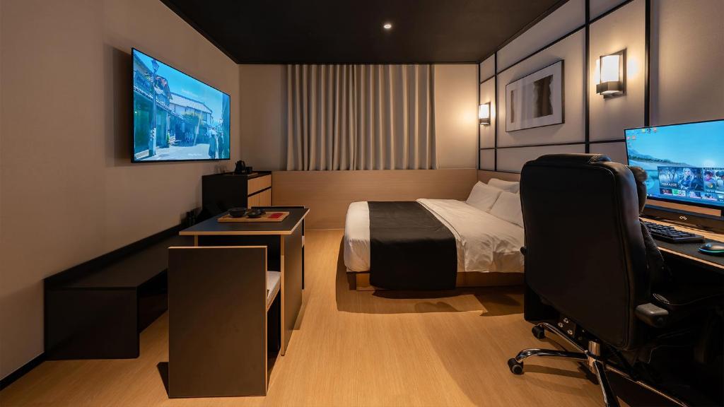 Μια τηλεόραση ή/και κέντρο ψυχαγωγίας στο Mitasuya Ryokan Hotel Gongju Donghaksa Temple by Aank