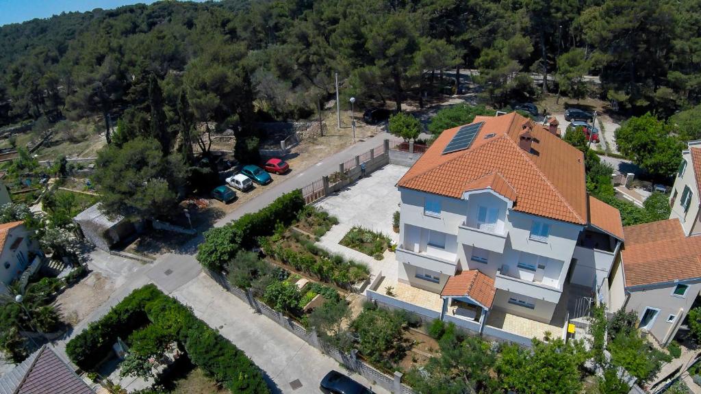 an overhead view of a house with a orange roof at Apartmani Dorita in Mali Lošinj