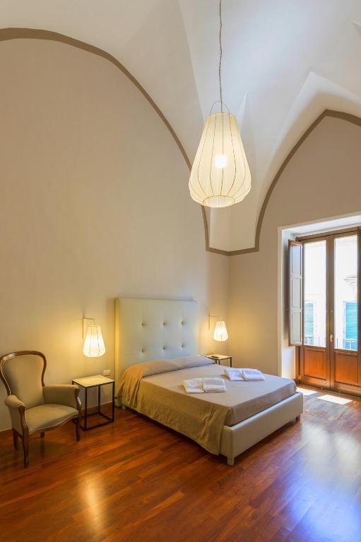 Postel nebo postele na pokoji v ubytování B&B Centro Storico Lecce