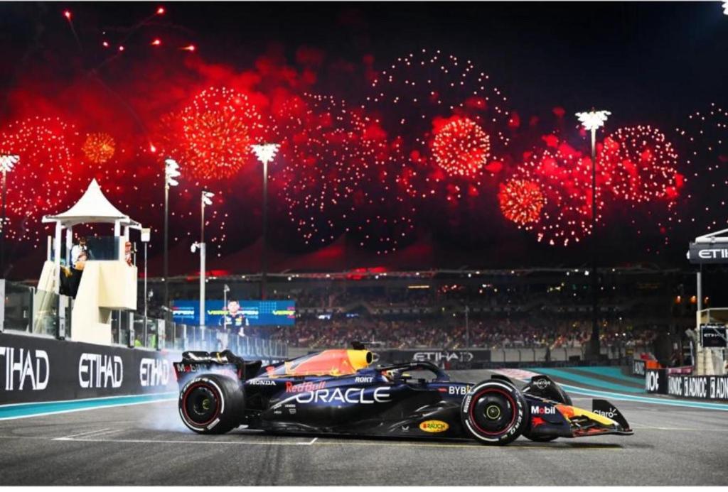 a racing car on the track at night at Pearl of Abu Dhabi in Abu Dhabi