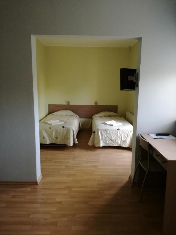 Postel nebo postele na pokoji v ubytování Nuustaku Villa