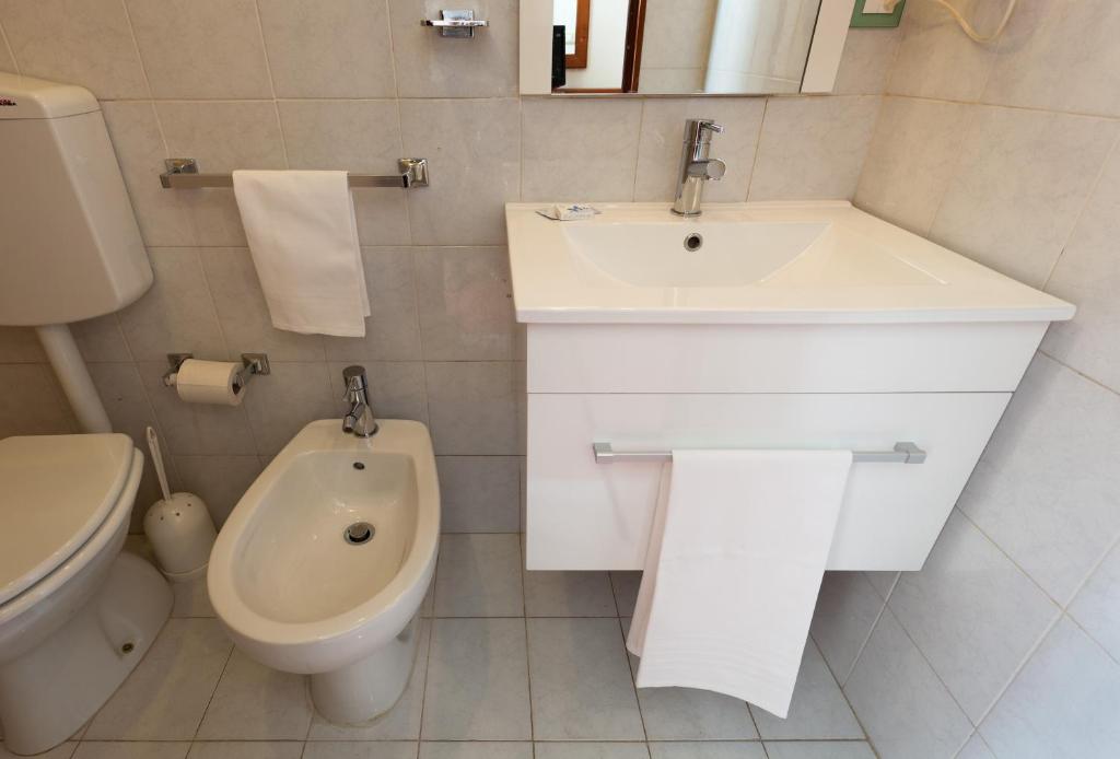 A bathroom at Parking Hotel Giardino