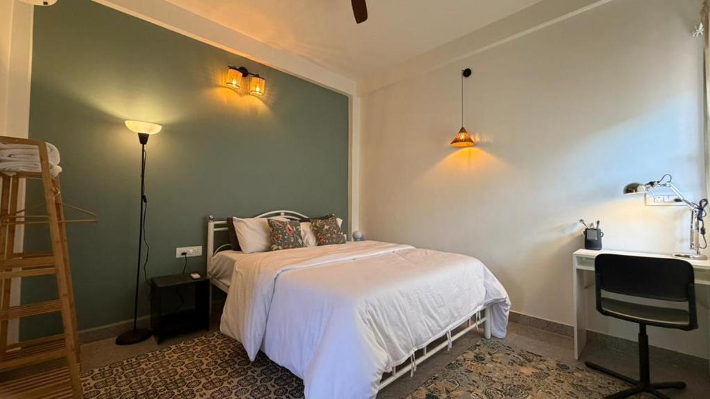 Giường trong phòng chung tại Wonderland Mandrem