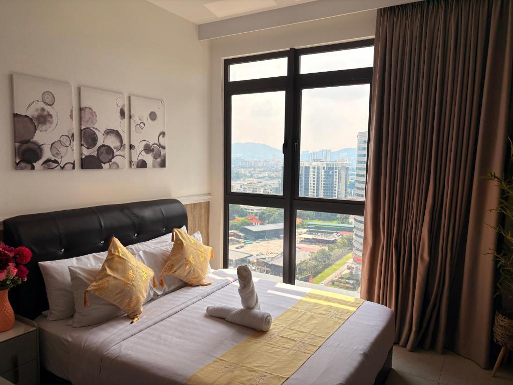 Ένα ή περισσότερα κρεβάτια σε δωμάτιο στο Luxury Studio - City View - LRT - KLCC - KL - Gleneagles
