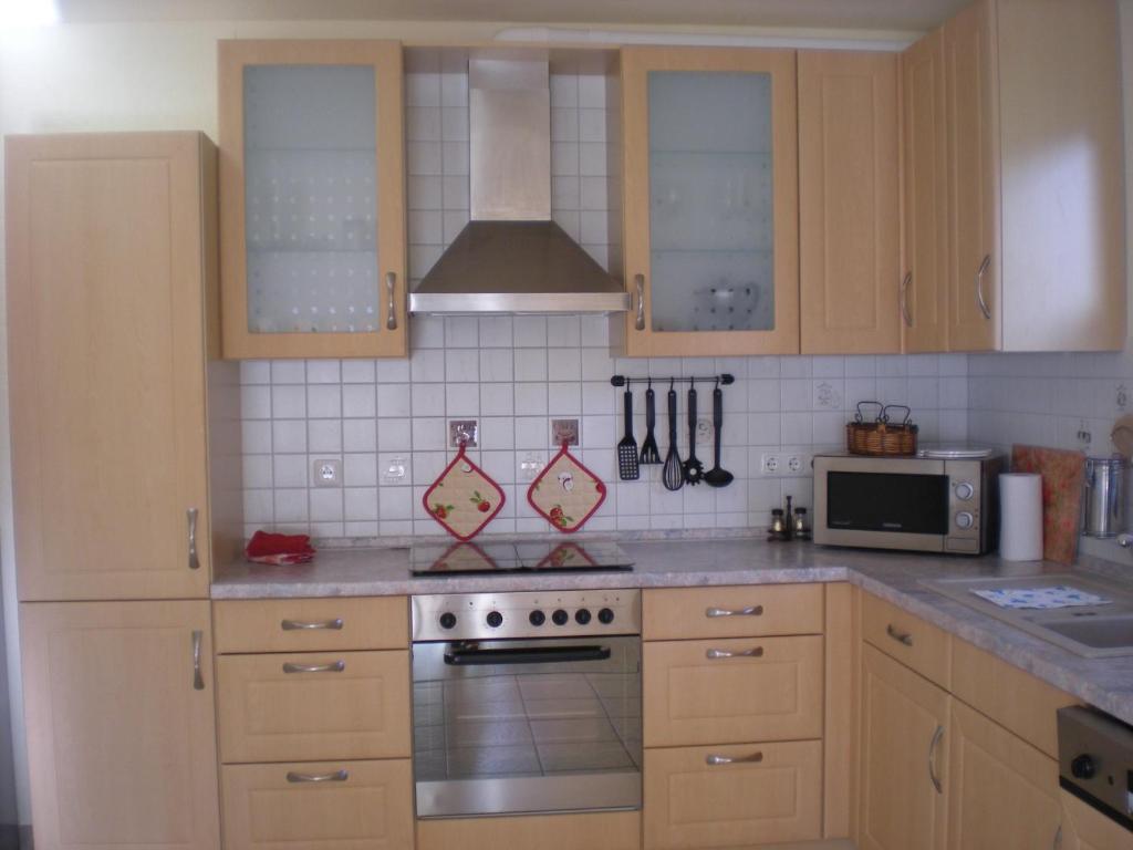 Kuchyň nebo kuchyňský kout v ubytování Ferienhaus Arielle