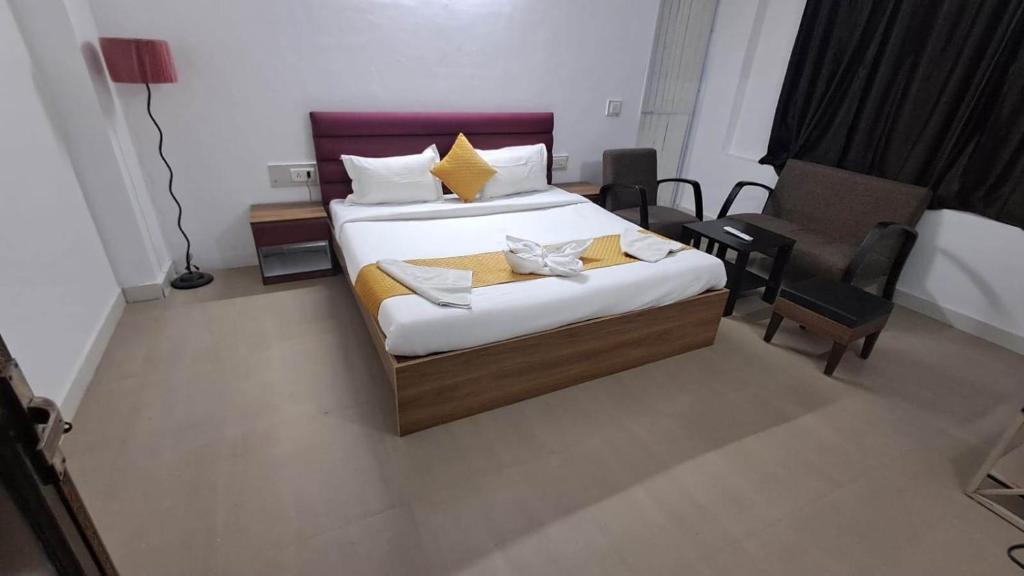 Ένα ή περισσότερα κρεβάτια σε δωμάτιο στο Soooper Hotel 2