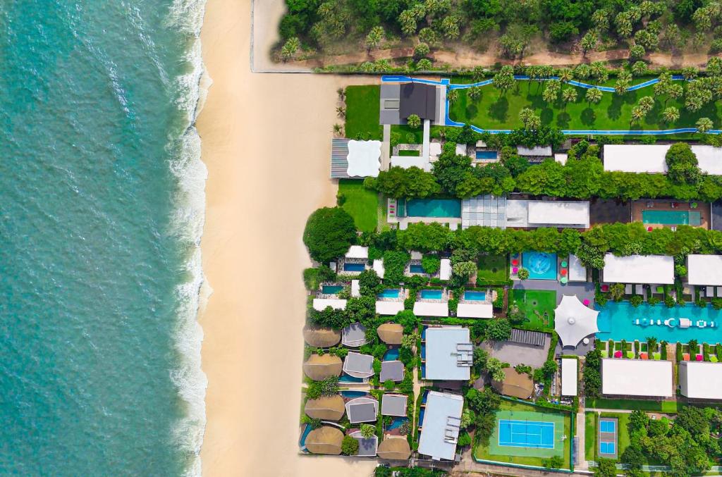 an aerial view of the beach and resort at SO/ Sofitel Hua Hin in Cha Am