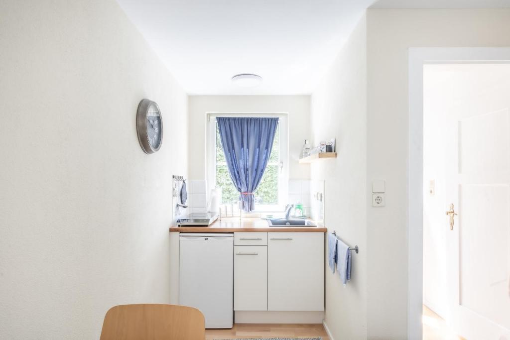 Kuchyň nebo kuchyňský kout v ubytování Casa Verde Dornbirn