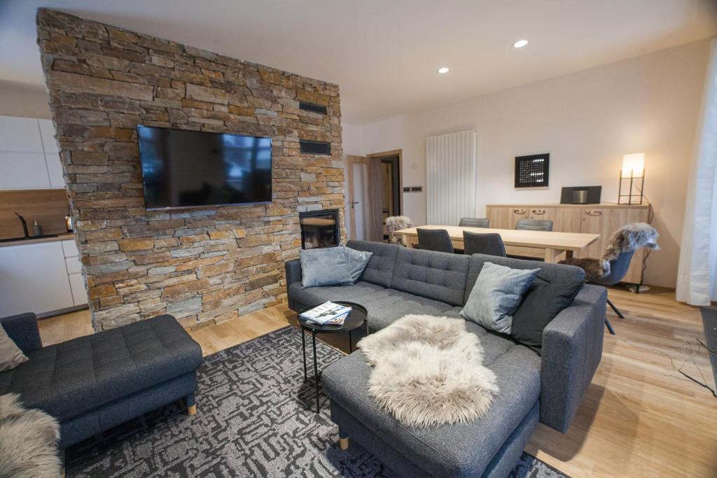 Гостиная зона в Apartment 25 JAVOR - Rezidence & Wellnes