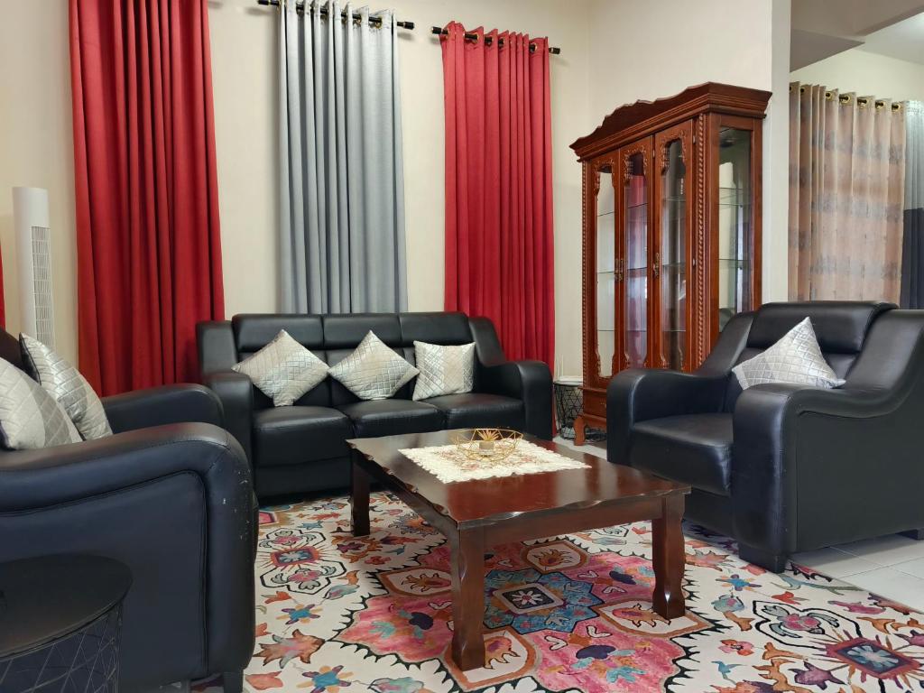 Un lugar para sentarse en Chek Embun Homestay