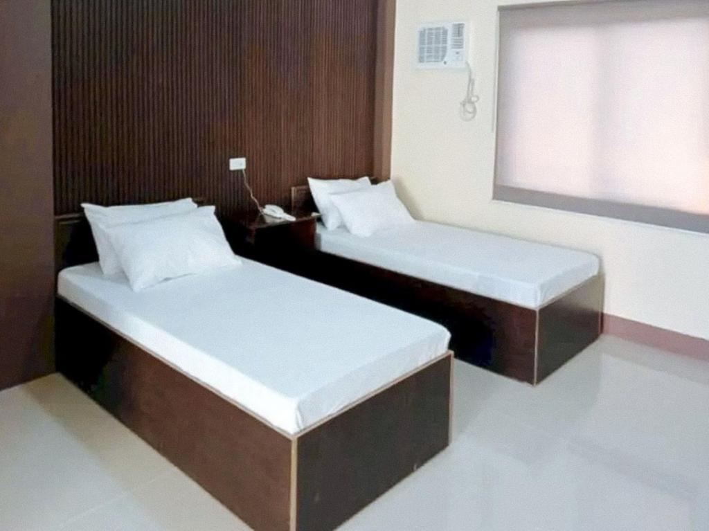 RedDoorz at Ranchotel Kalibo Aklan - Zweibettzimmer