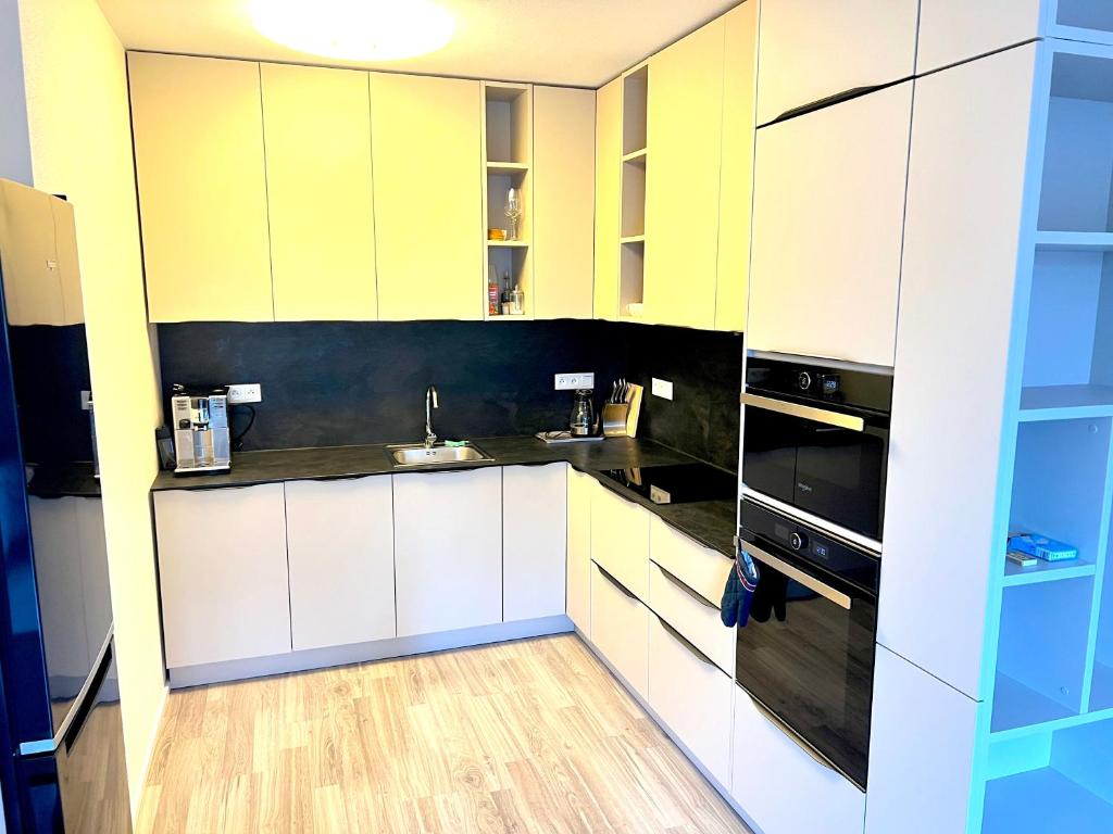 Kuchyň nebo kuchyňský kout v ubytování Moderné ubytovanie v Senici