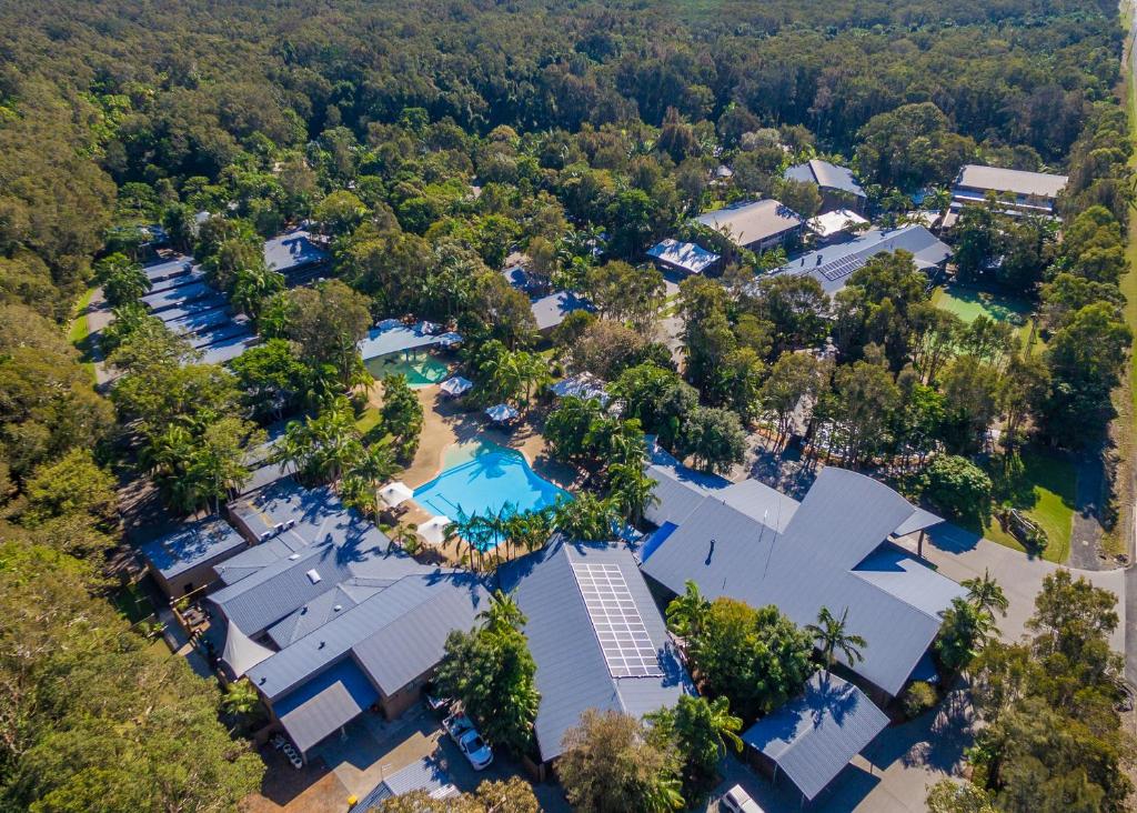 an overhead view of a house with a pool and trees at NRMA Angourie Resort, Yamba in Yamba