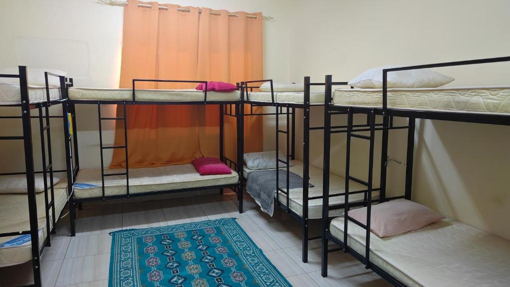 Postel nebo postele na pokoji v ubytování Oman 1