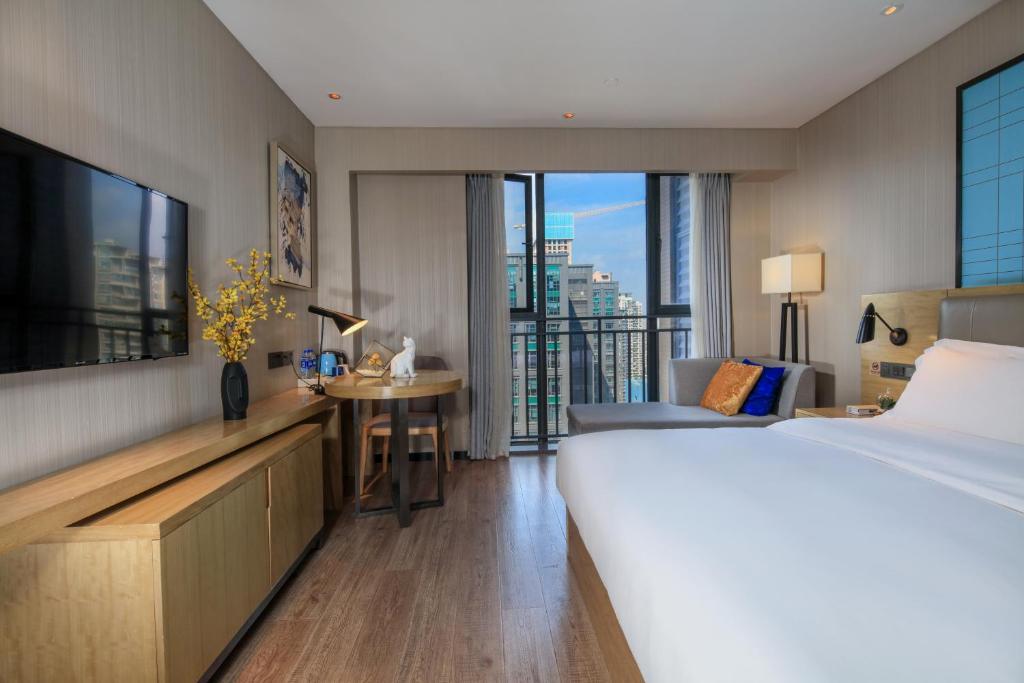 En eller flere senge i et værelse på Starway Hotel Chengdu Jianshe Road SM Plaza