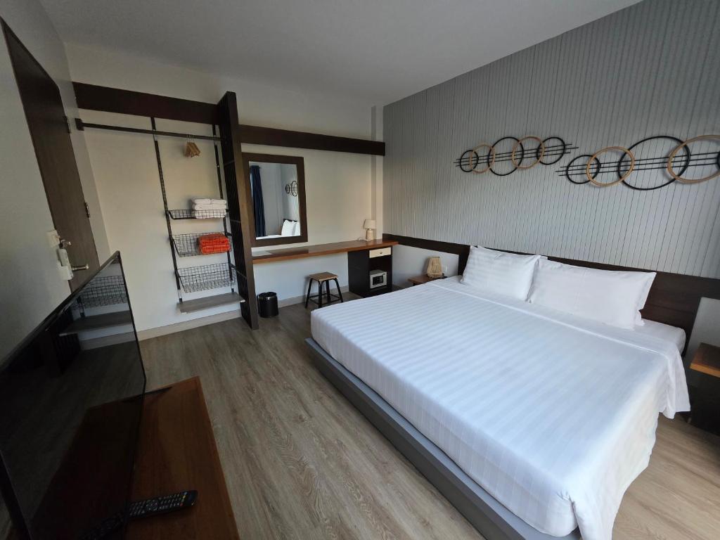 Postel nebo postele na pokoji v ubytování The One Cozy