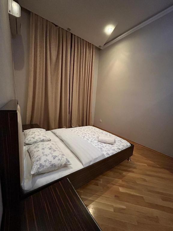 Llit o llits en una habitació de Apartment Central