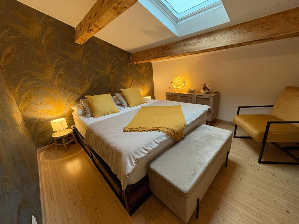 Ένα ή περισσότερα κρεβάτια σε δωμάτιο στο Le Doux Rivage avec Vue Lagune Nature Plage à Pied Clim Parking Prive