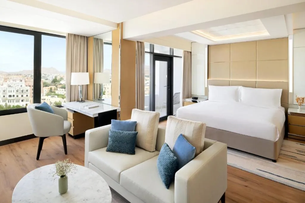 1 King Bed One-Bedroom Suite Living Dining Area