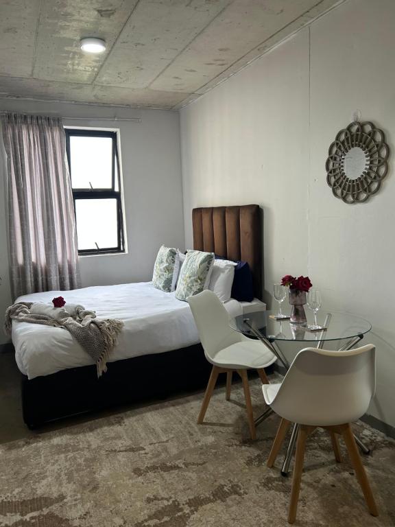 Ένα ή περισσότερα κρεβάτια σε δωμάτιο στο Views from The 509