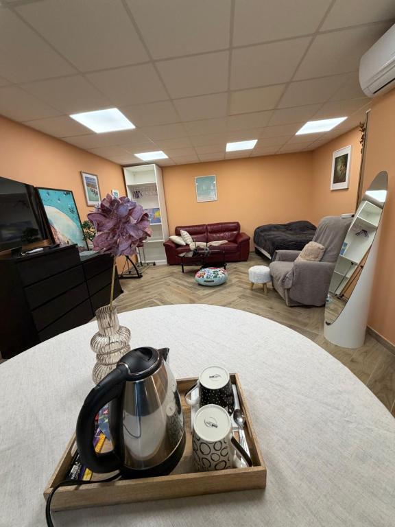 Χώρος καθιστικού στο Chambre privée avec salle de bain