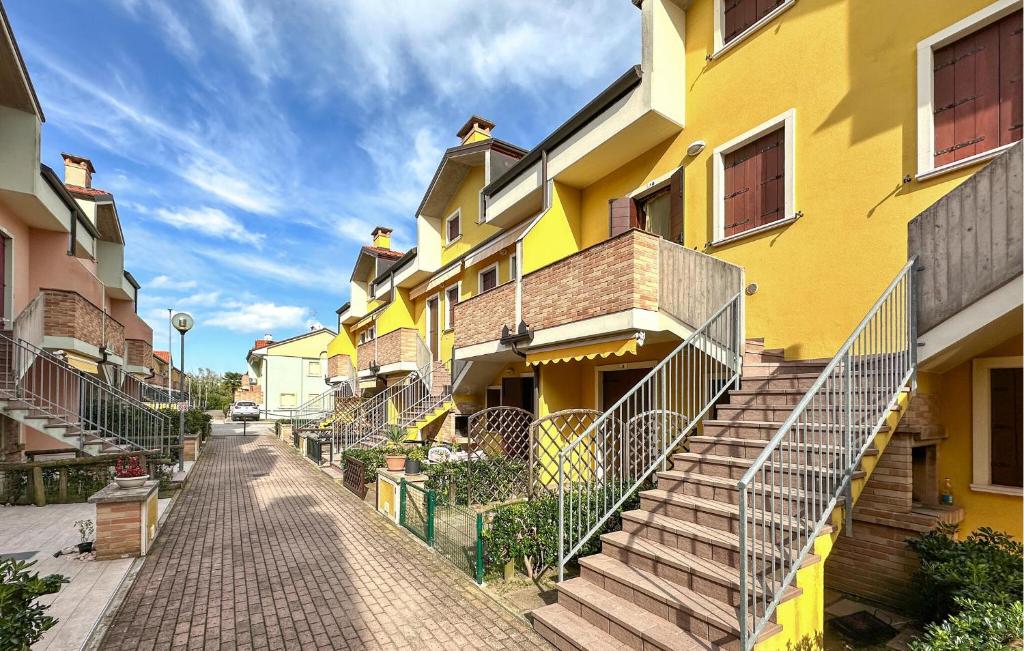 a row of buildings with stairs on a street at Solmare 5116 in Rosapineta