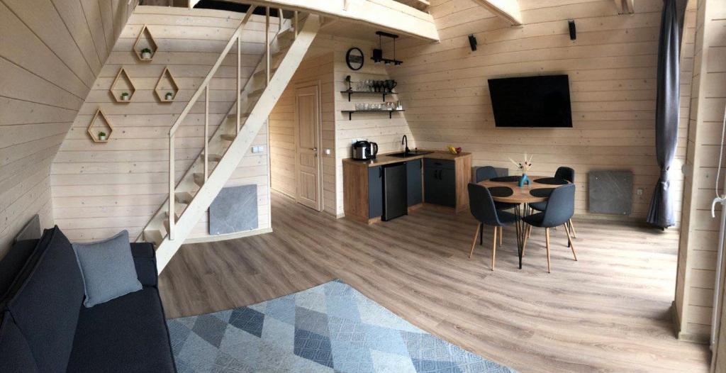 TV a/nebo společenská místnost v ubytování Pyramida House