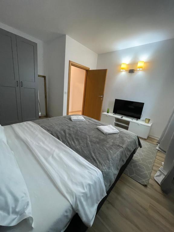 Postel nebo postele na pokoji v ubytování Marisah Rin Residence