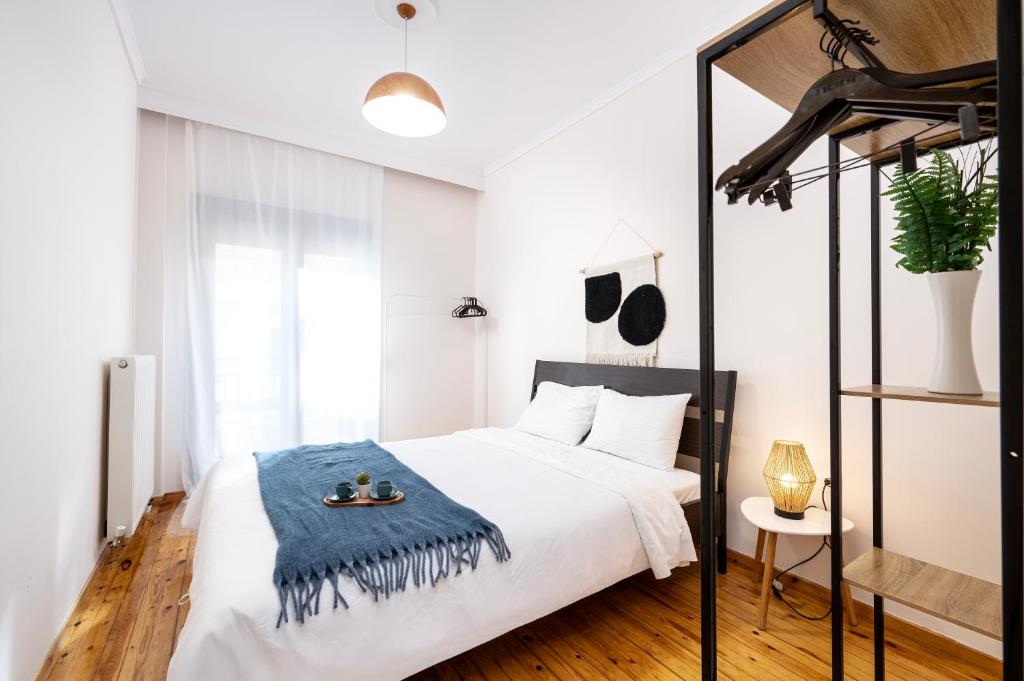 Ένα ή περισσότερα κρεβάτια σε δωμάτιο στο Houseloft Urban Retreat