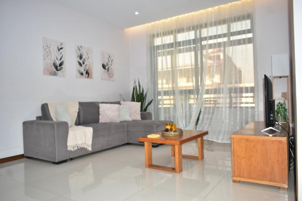 Zona d'estar a Cozy Palm