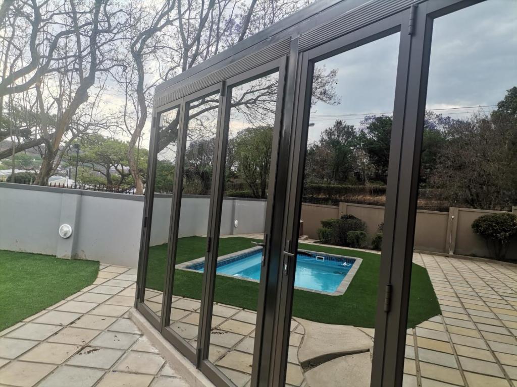 Бассейн в Sifumasa Guesthouse или поблизости