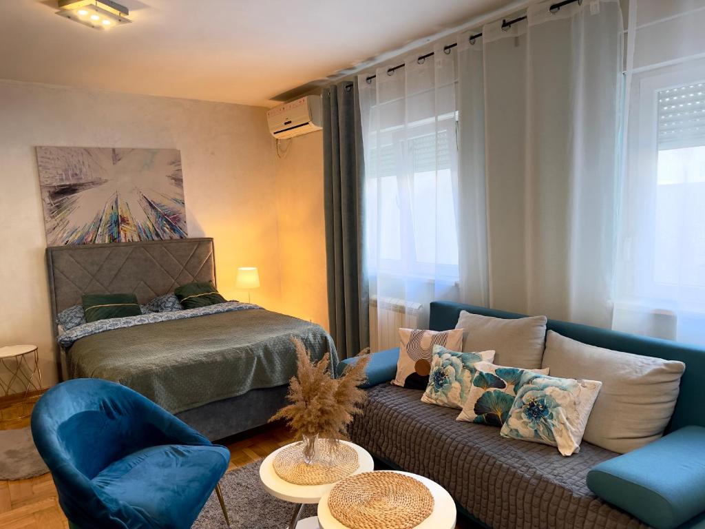 Ένα ή περισσότερα κρεβάτια σε δωμάτιο στο Belgrade Apartment 1