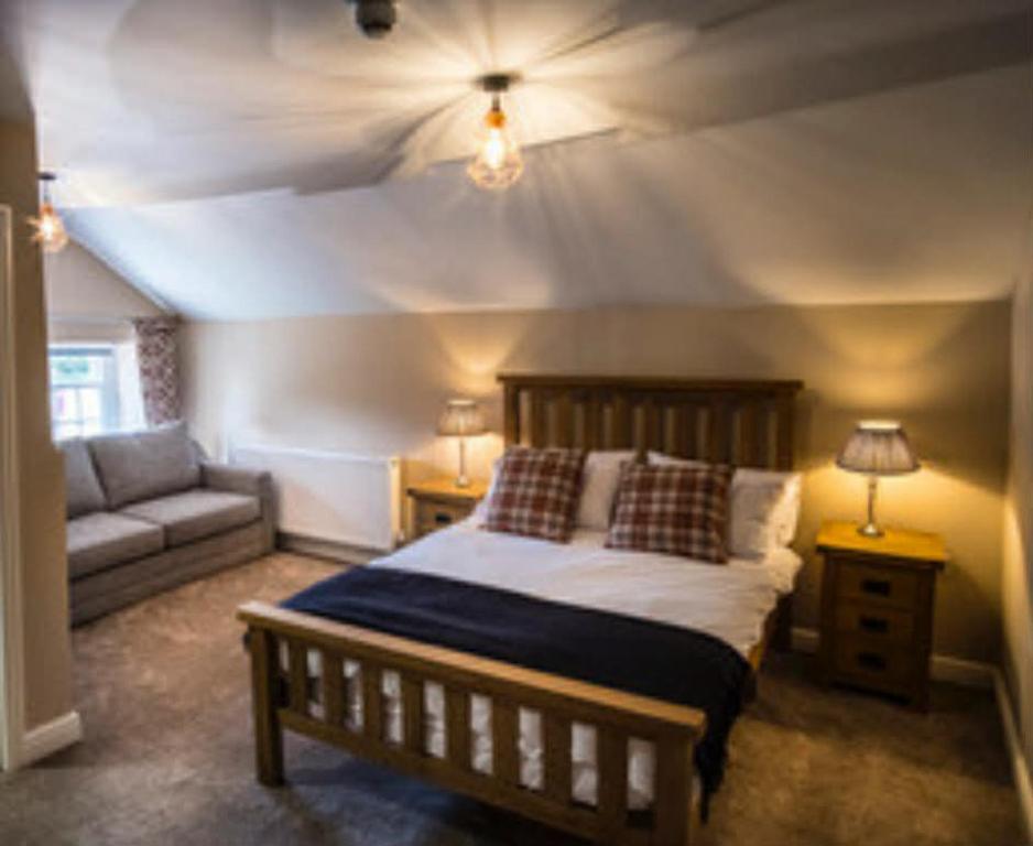 Ένα ή περισσότερα κρεβάτια σε δωμάτιο στο The Kings Head, Meifod