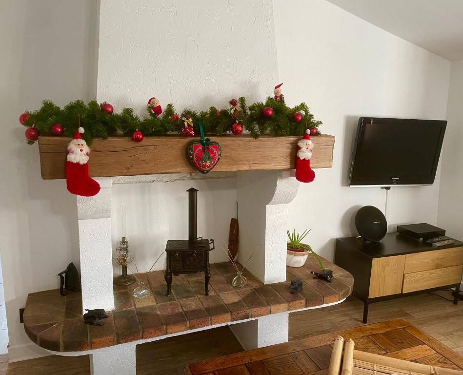 Μια τηλεόραση ή/και κέντρο ψυχαγωγίας στο Gîte le Moulin de Warnécourt