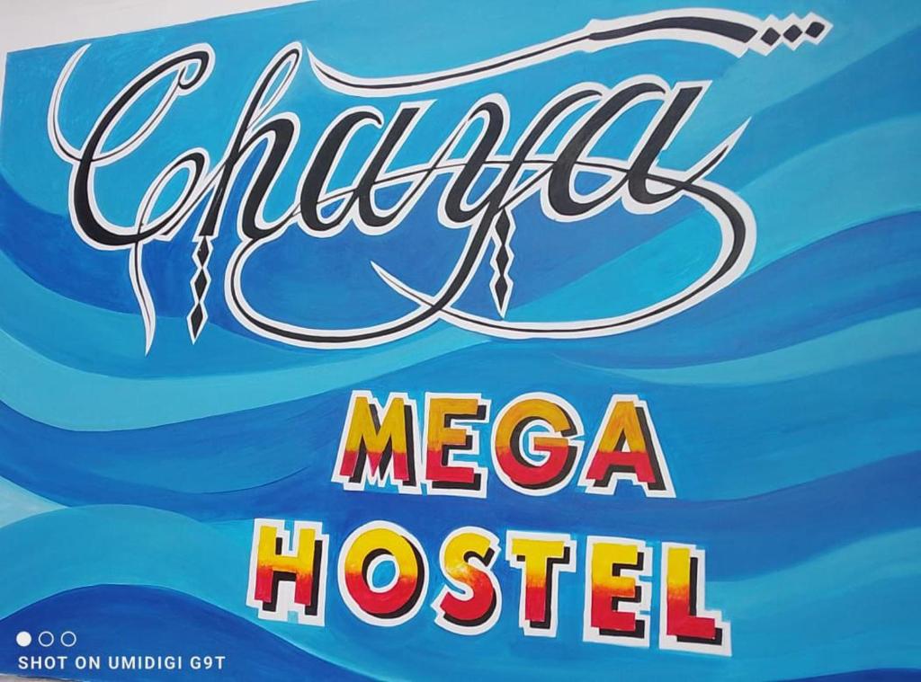 ミリッサにあるChaya Mega Hostelの水のあるメサ主催のイベントの看板
