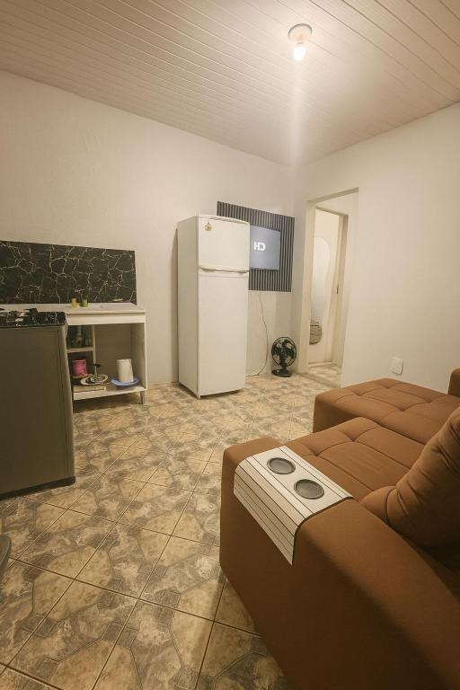 Kuchyň nebo kuchyňský kout v ubytování Suíte Praia dos Anjos