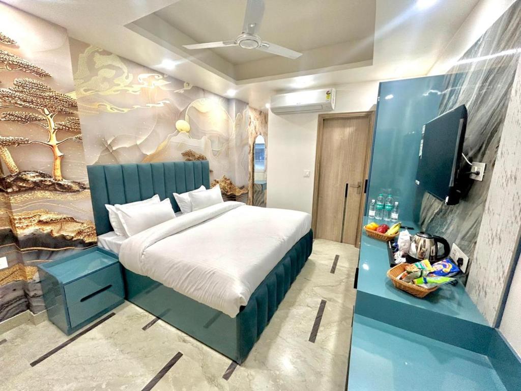 Ένα ή περισσότερα κρεβάτια σε δωμάτιο στο Hotel Royal Gold Palace