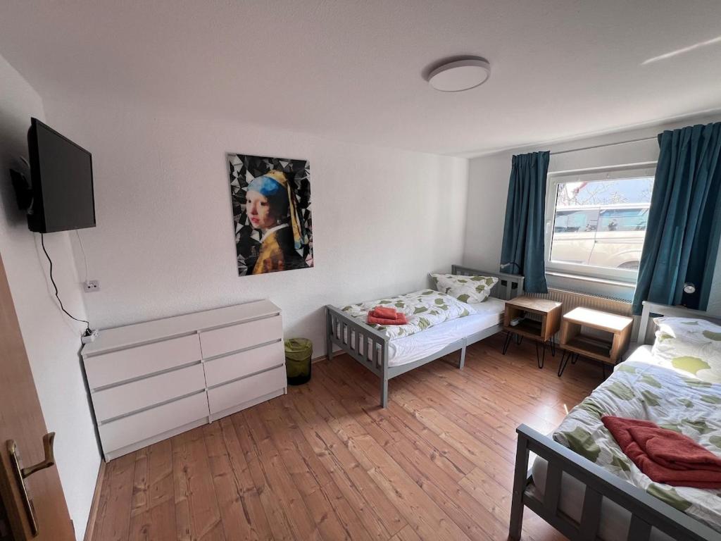 En eller flere senge i et værelse på Siedlung