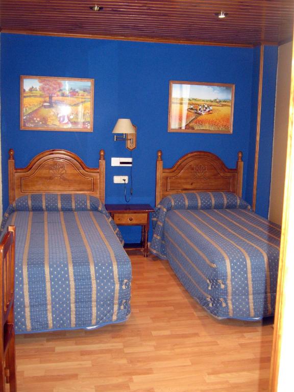 Postel nebo postele na pokoji v ubytování Casa La Abadía