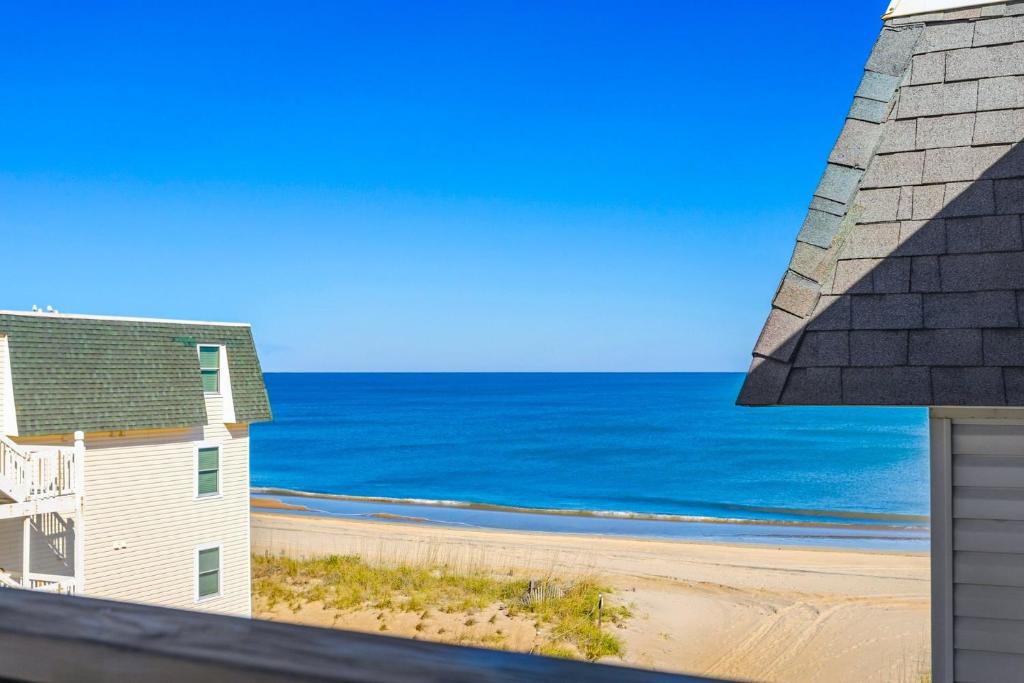 a view of the ocean from a beach house at AV2-3E - Don't Blink in Croatan Shores