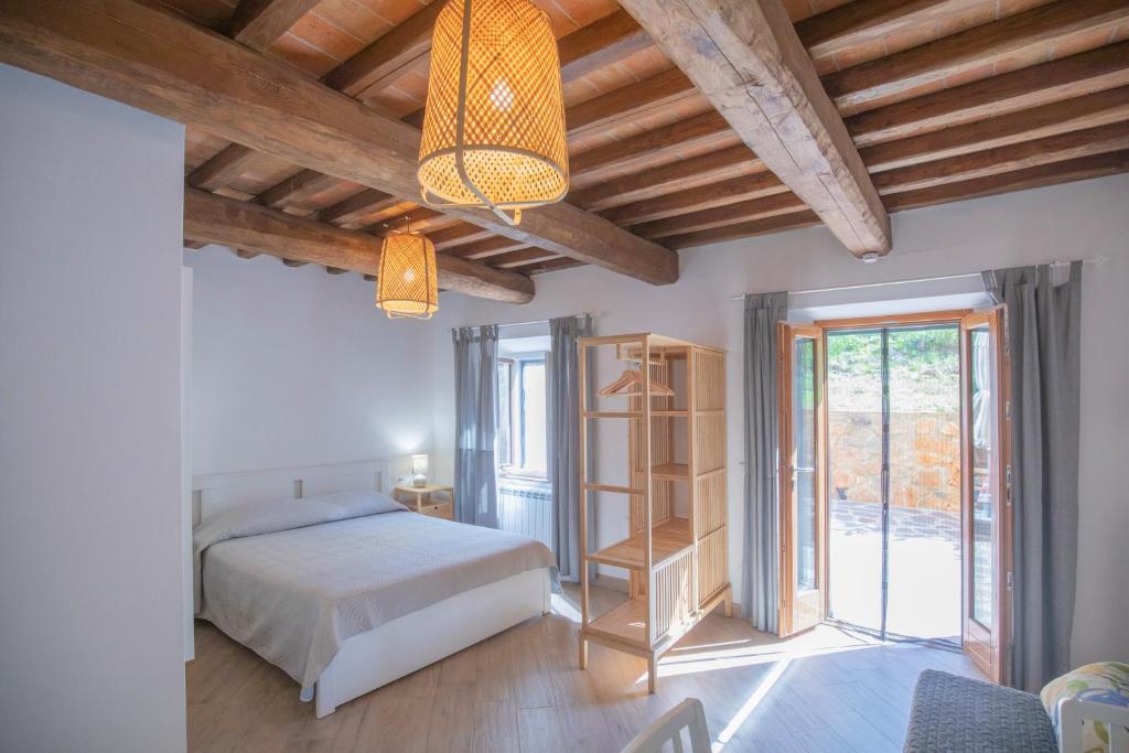 En eller flere senge i et værelse på Residenza La Chiusa 1984 by ElbaSummer